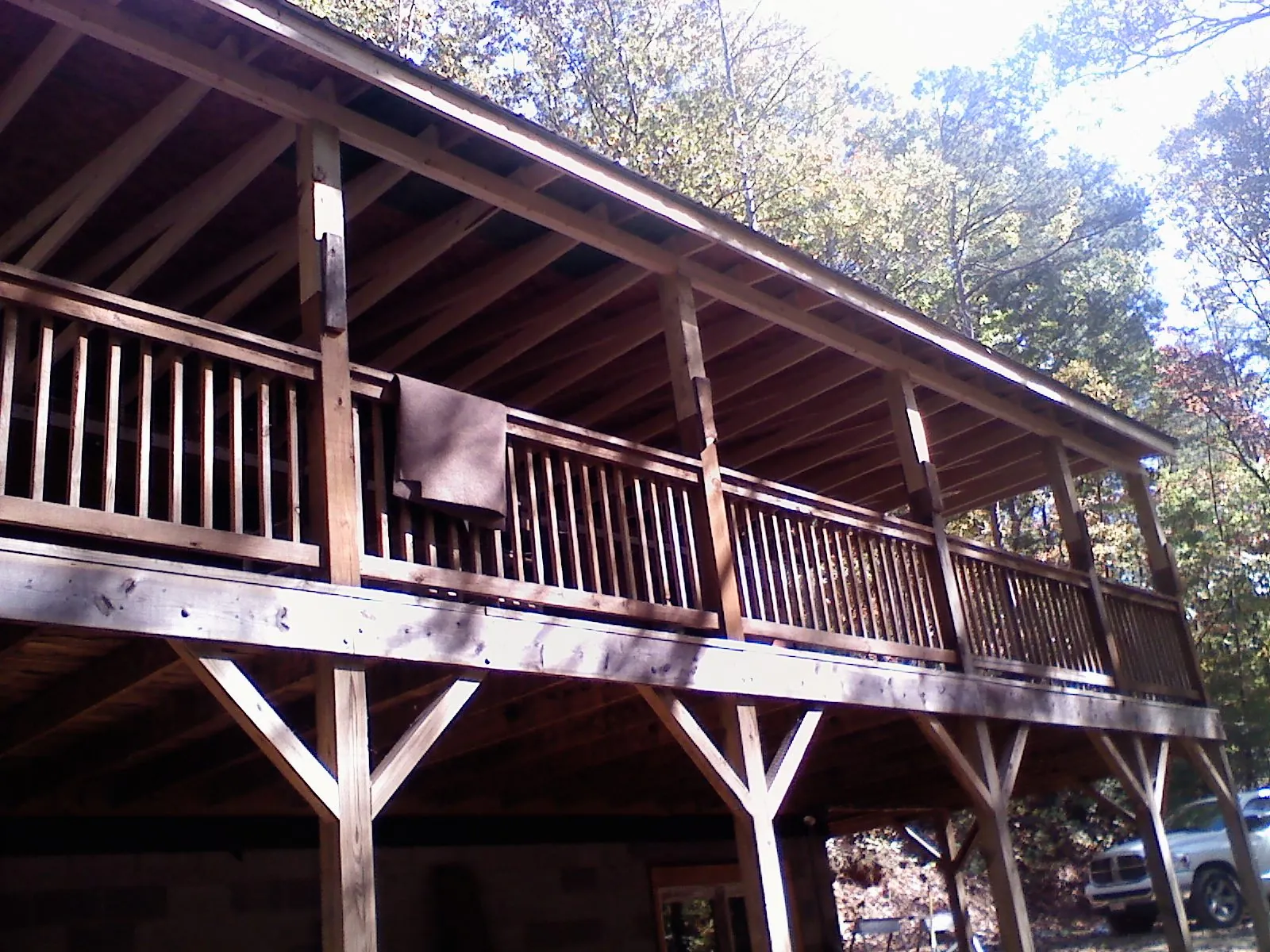 Timber framing under a new elevated porch and deck — Roof Leak Repair in Redmond by Roofing Brothers